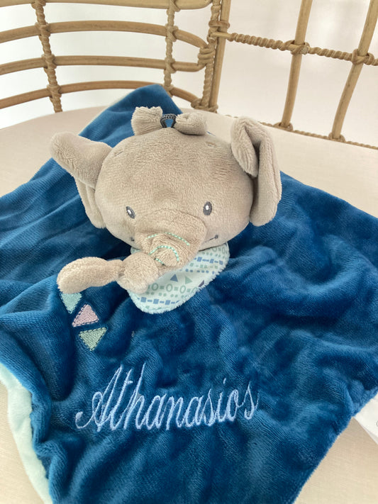 Personalized teal elephant baby comforter with the name 'Athanasios' embroidered on it.
